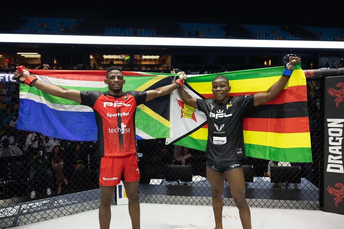 Image of Nkosi Ndebele (left) and Simbarashe Hokonya (right) holding their nations' flags at PFL Rwanda