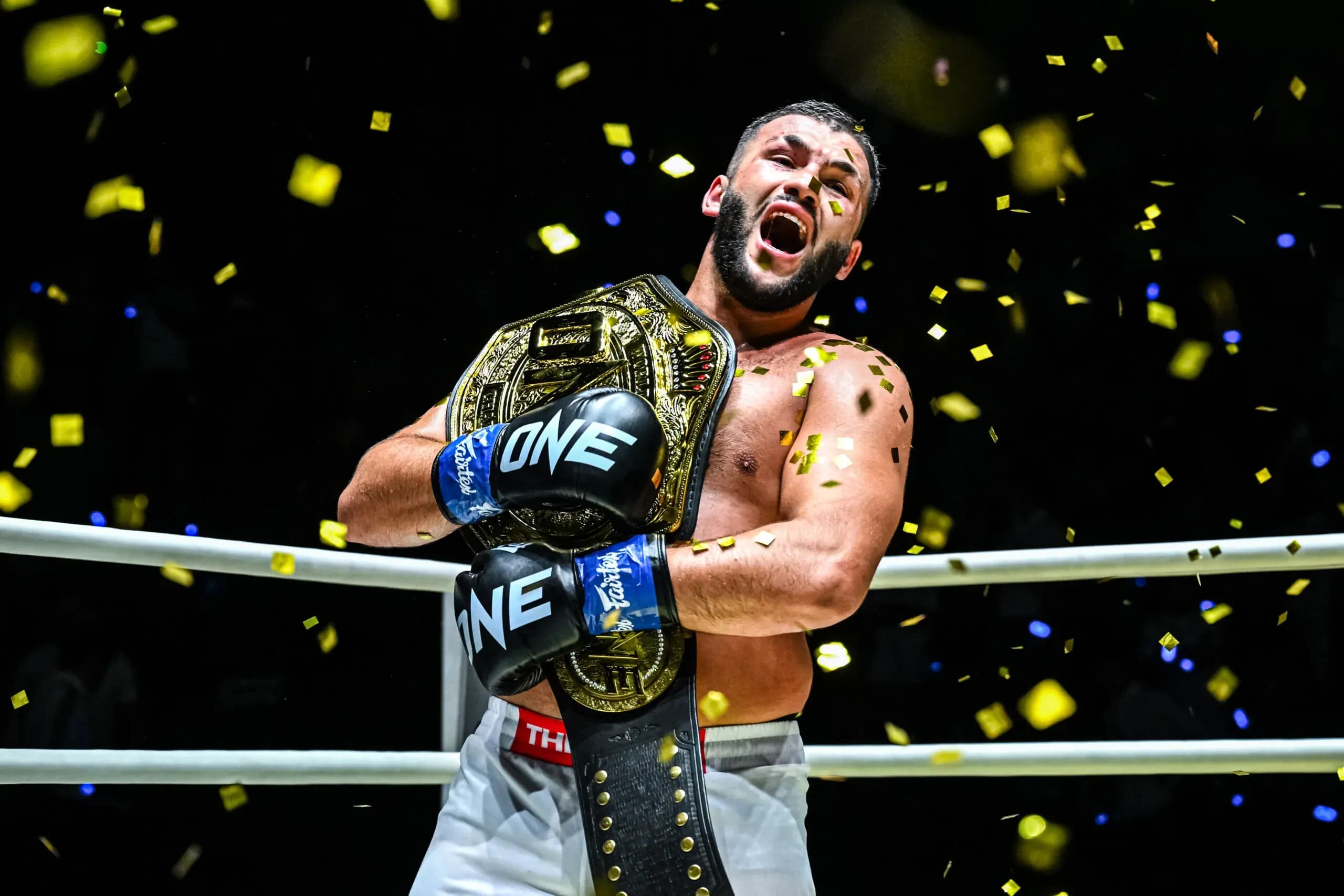Kickboxer Samet Agdeve with the ONE Championship belt