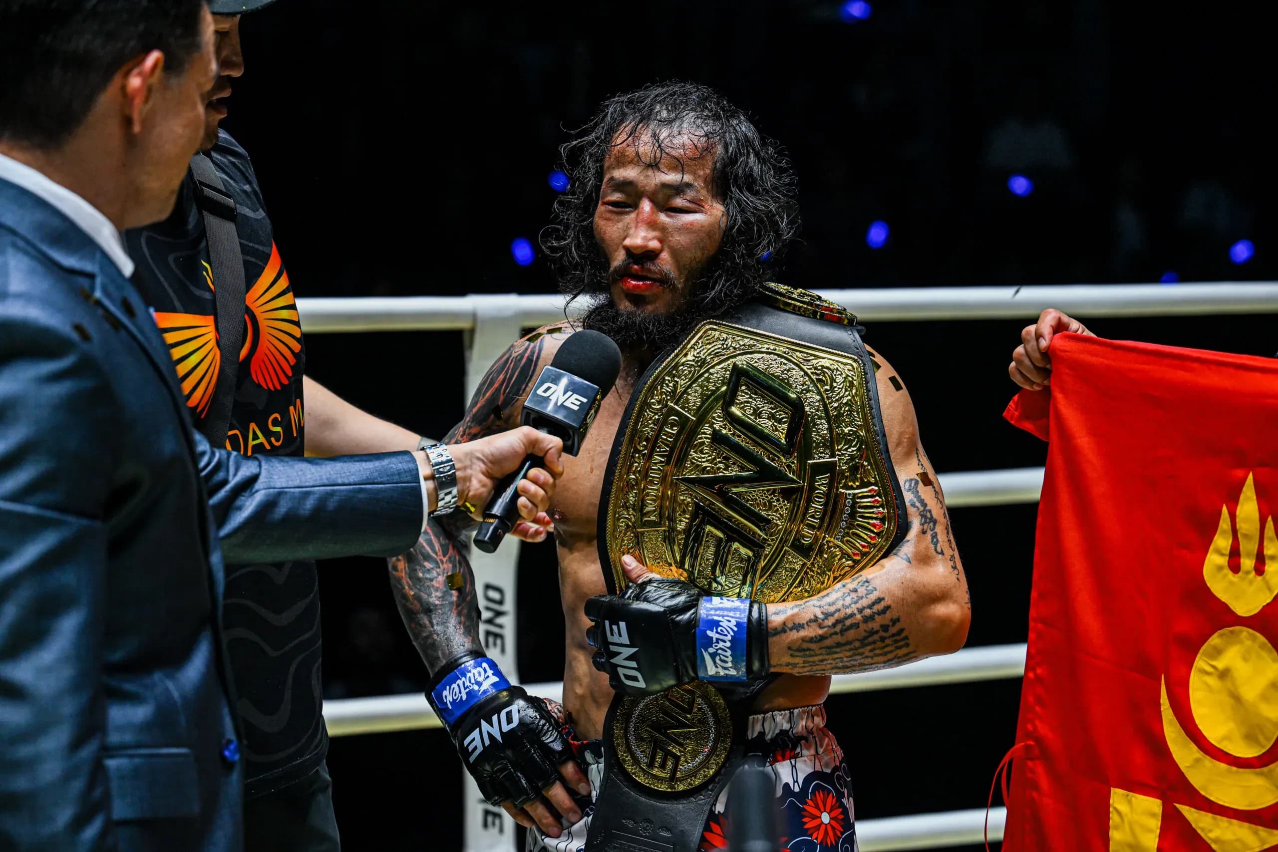 Mongolian MMA star Enkh-Orgl Baatarkhuu with the ONE Championship belt
