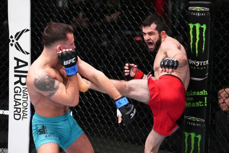 Timur Valiev kicks Trevor Wells in their bantamweight fight during the filming of The Ultimate Fighter at UFC APEX on March 03, 2023 in Las Vegas, Nevada.