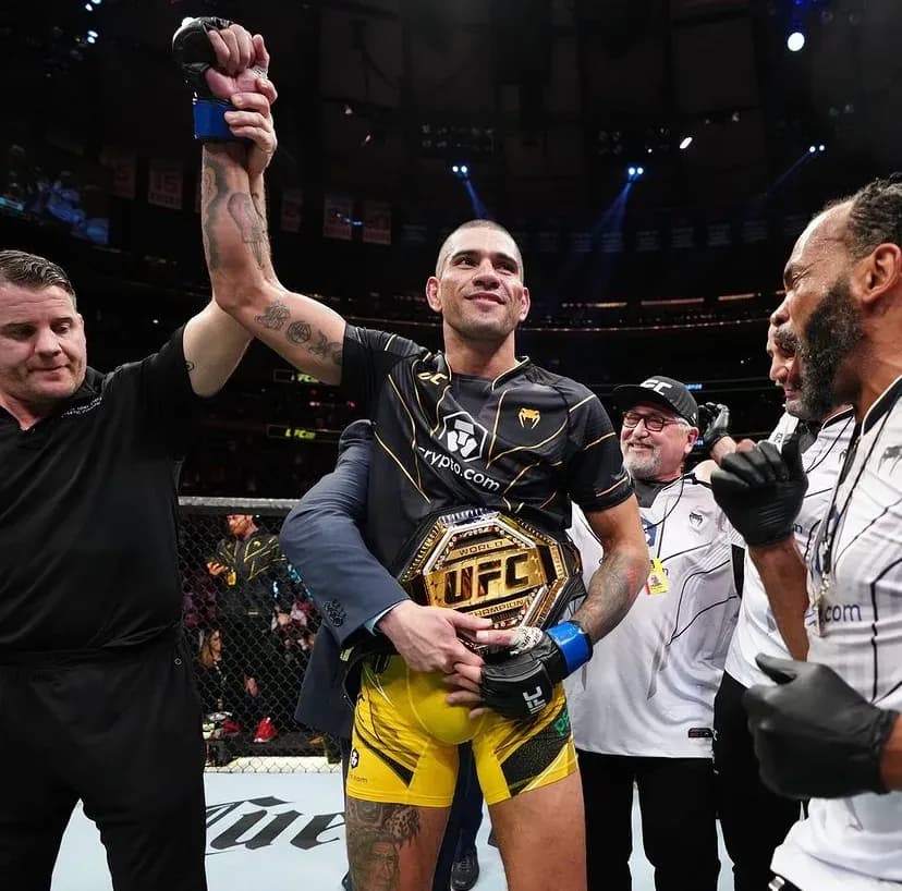 Alex Pereira celebrates victory at UFC 281