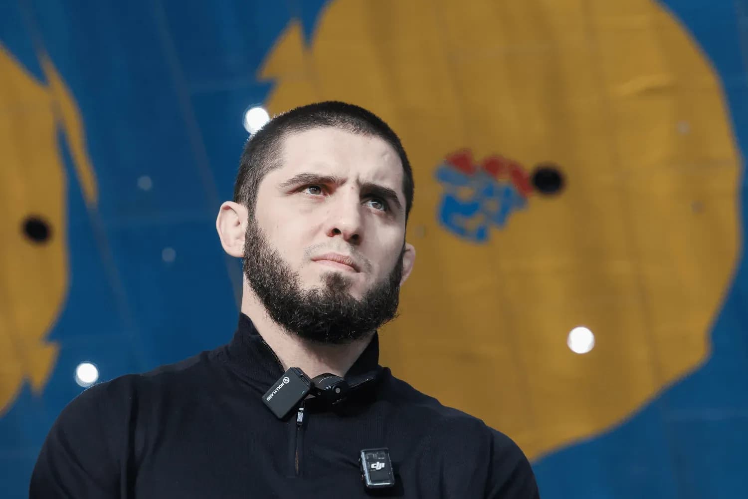 Islam Makhachev looks on during an interview