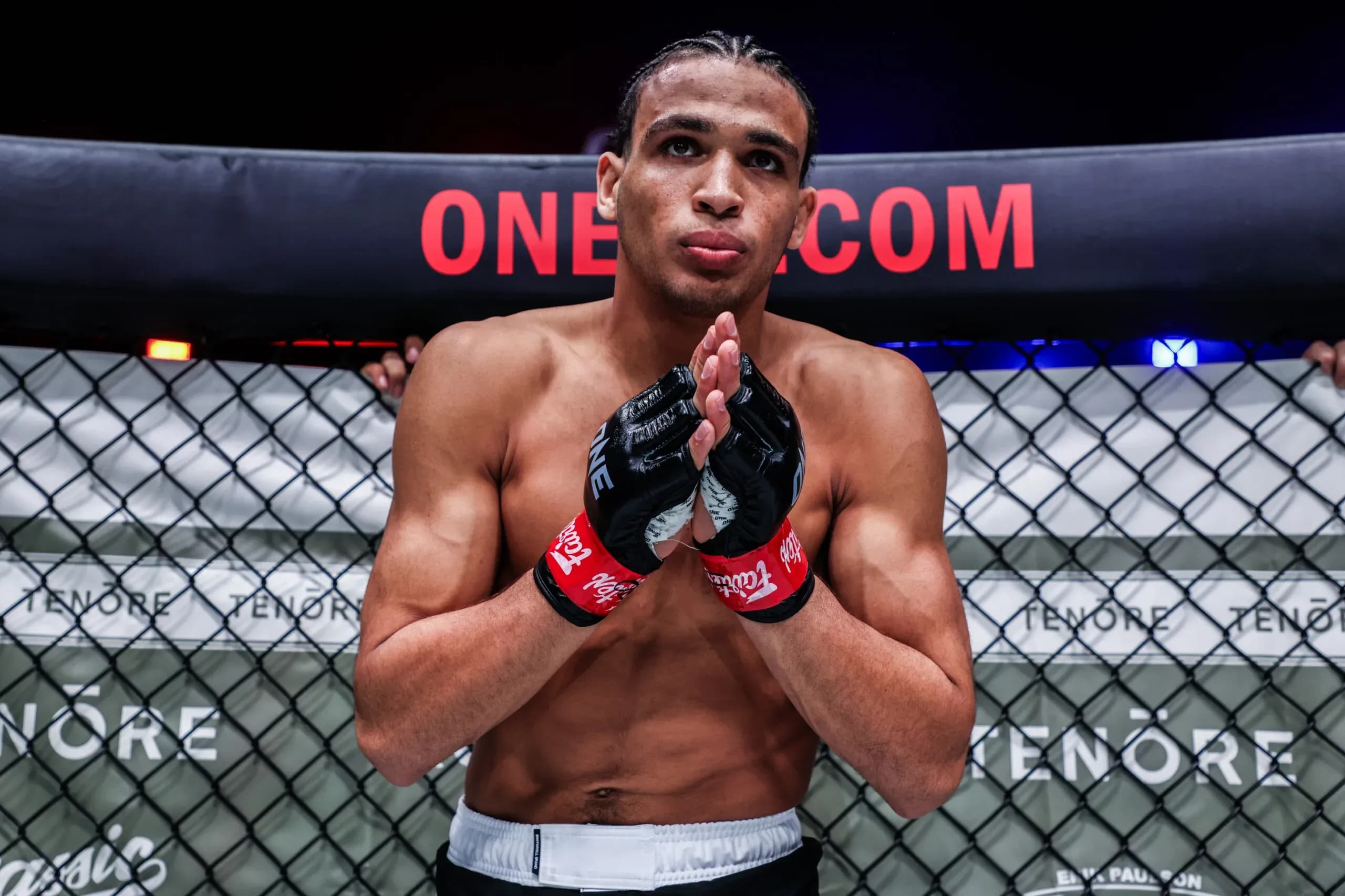 Kade Ruotolo stands in the cage, ready to compete in MMA