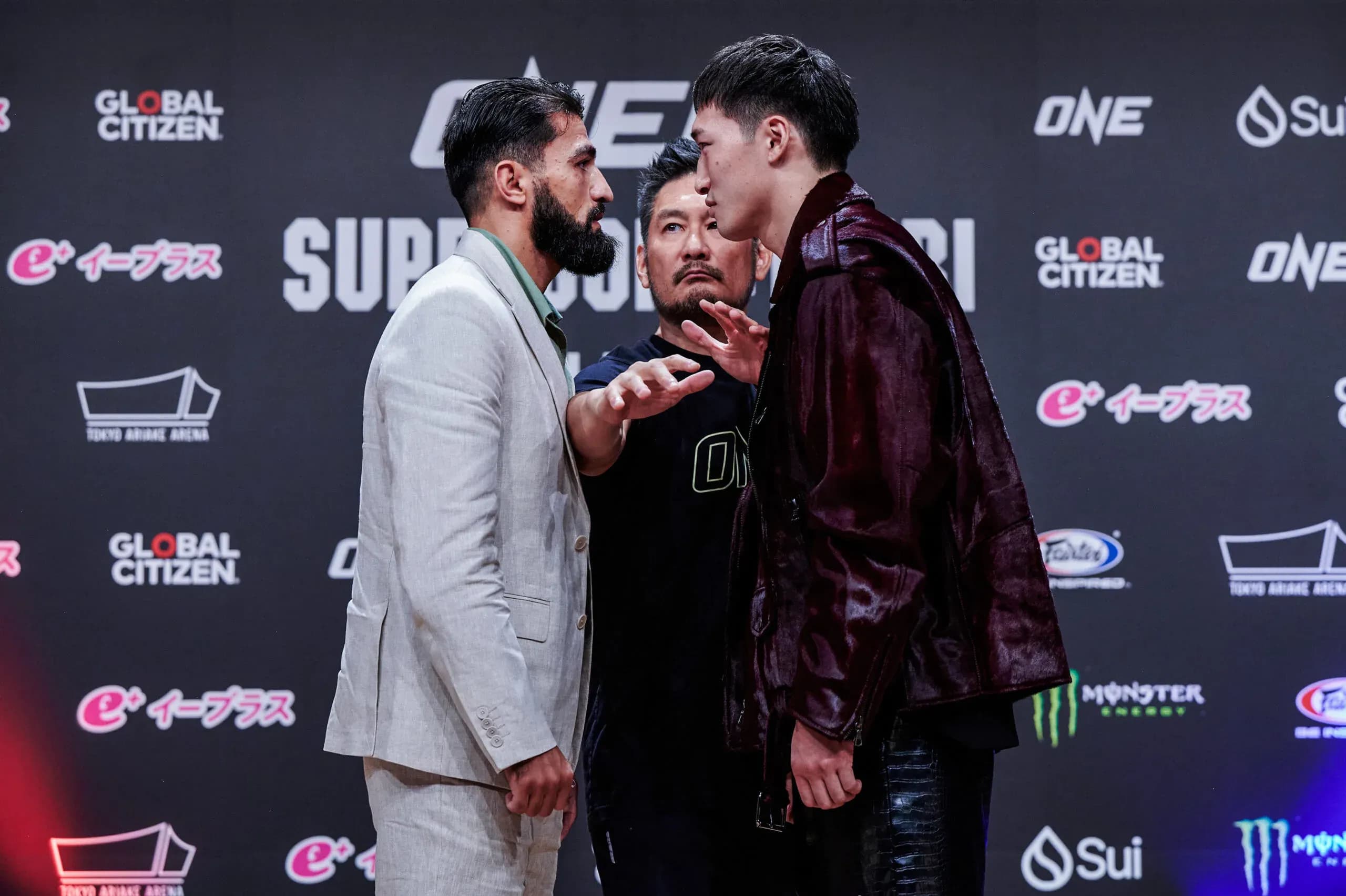 Kickboxers Marat Grigorian and Rukiya Anpo stare each other down