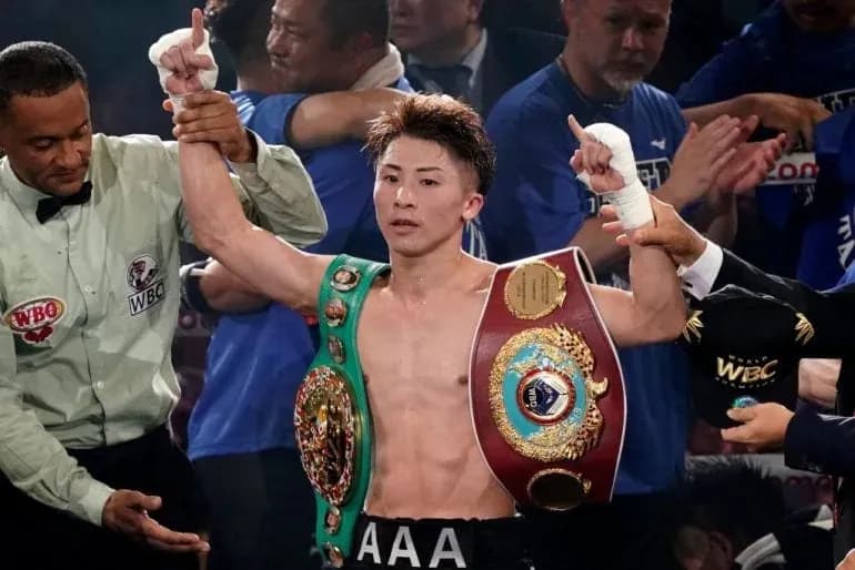 Naoya Inoue celebrates becoming a two-division champion.