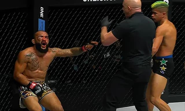 Andrade lands a low blow on Lineker
