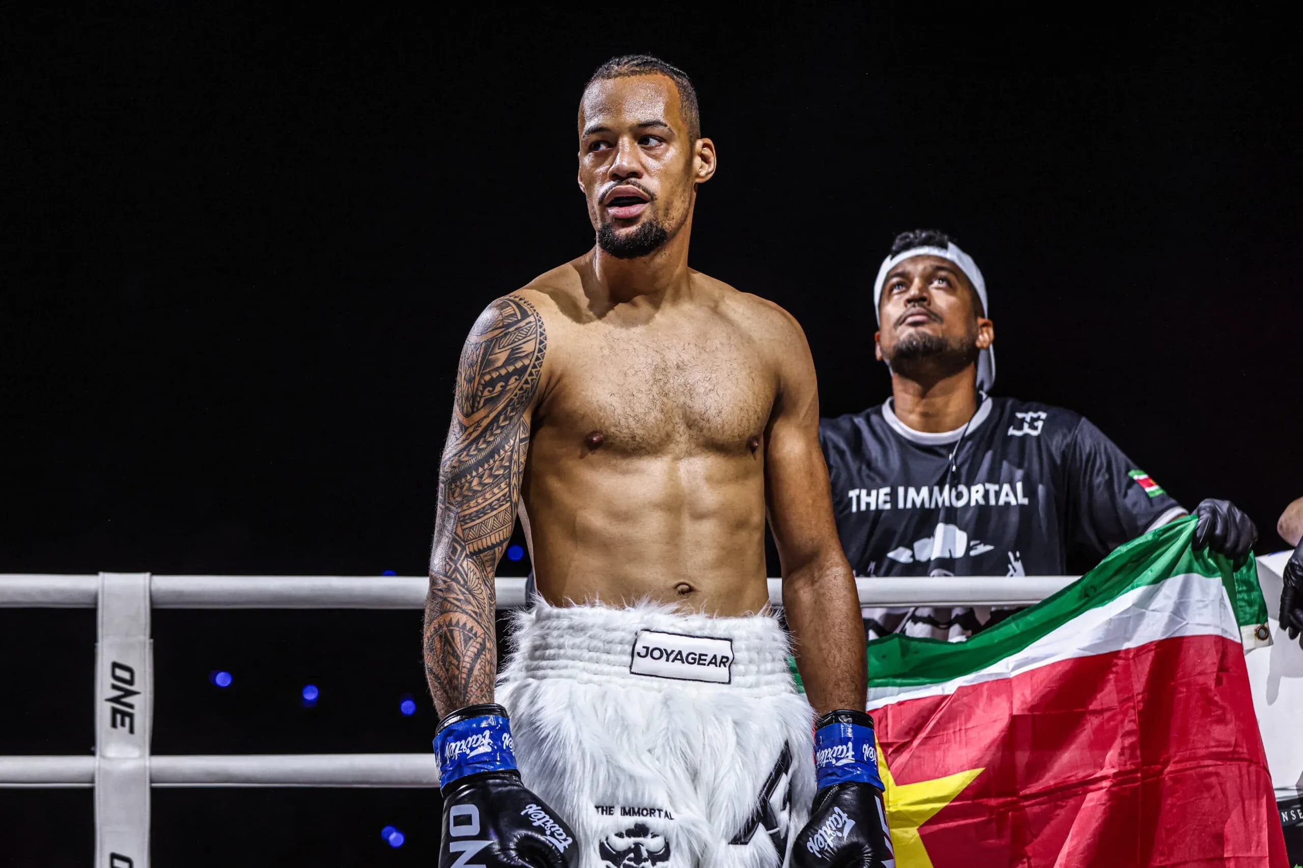 Lightweight kickboxer Regian Eersel stands in the ring