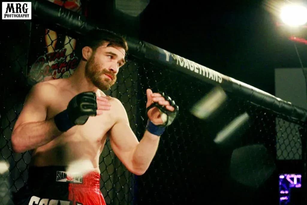Cage Titans 41 Johnny Campbell