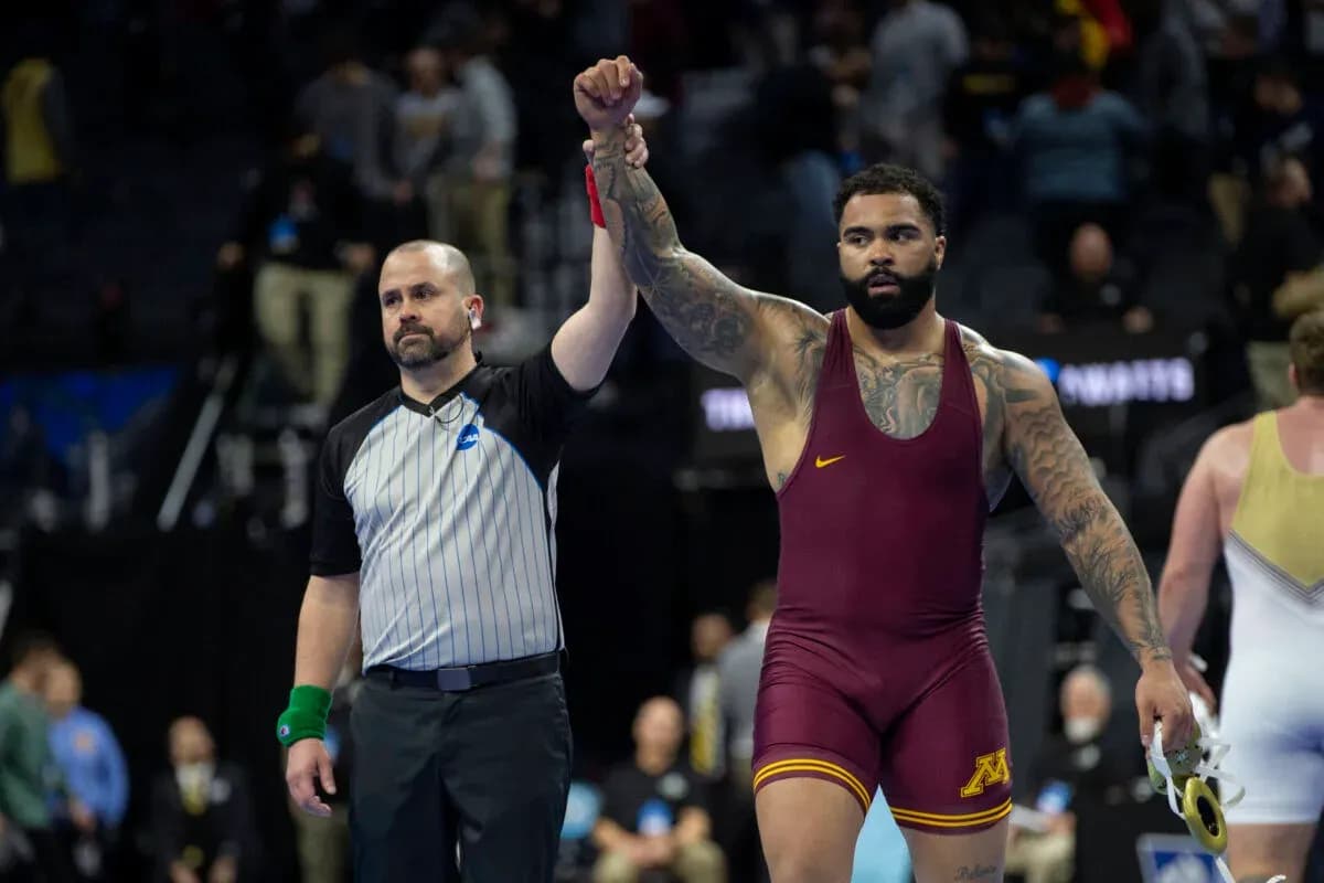 Gable Steveson having his hand raised