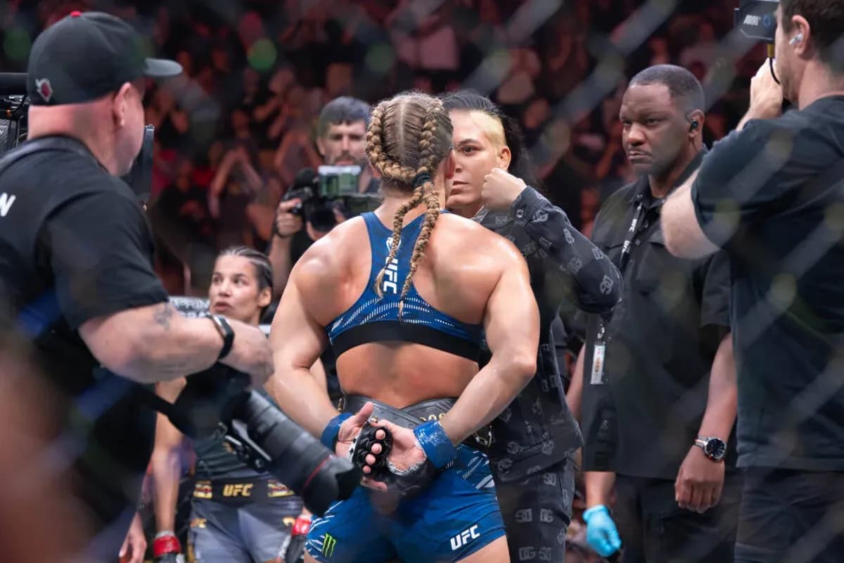 Amanda Nunes and Harrison stare down