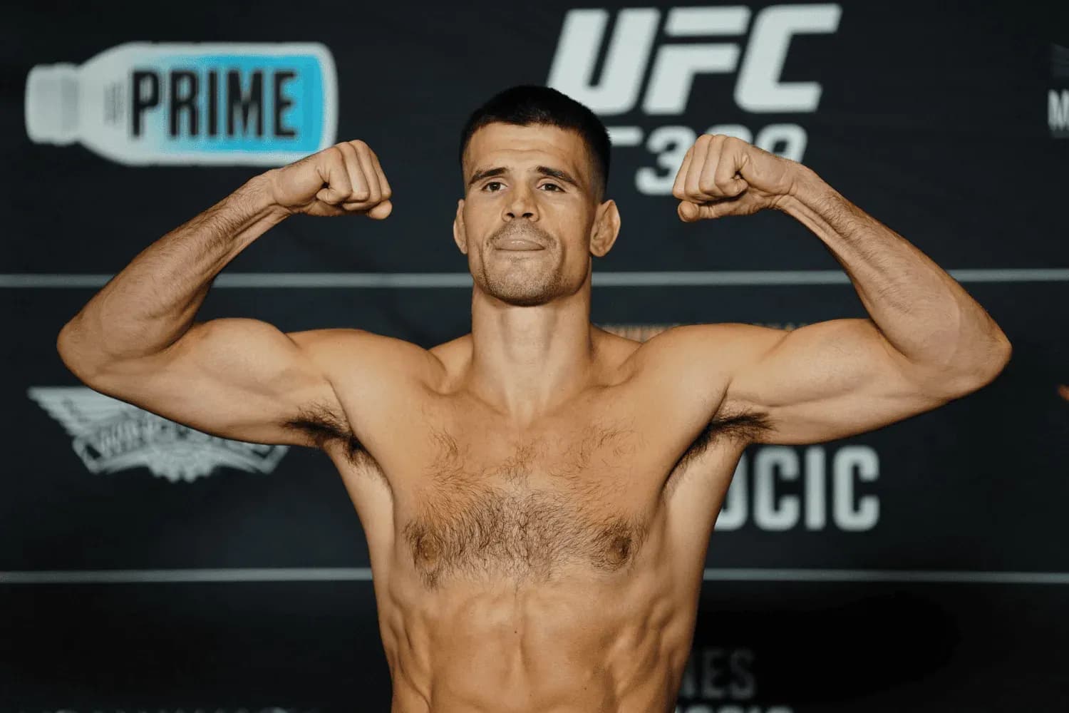Mickey Gall steps on the scale for the official weigh-ins for UFC309