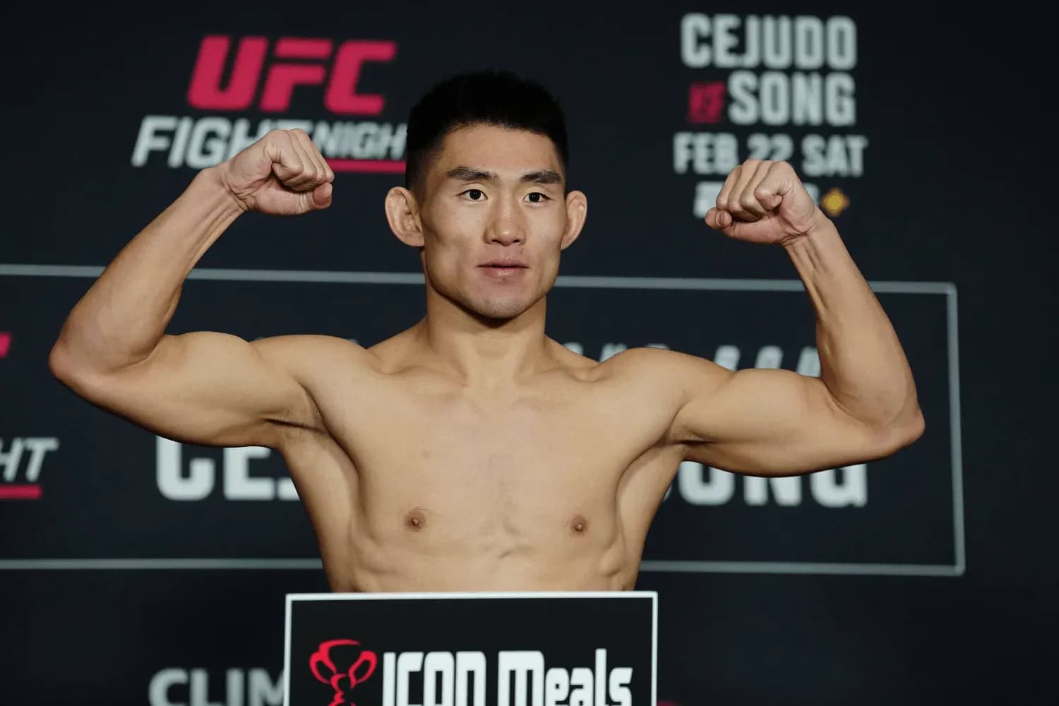Song Yadong steps on the scale for the official weigh-ins at Hyatt Olive 8 Hotel for UFC Fight Night - Cejudo vs Song