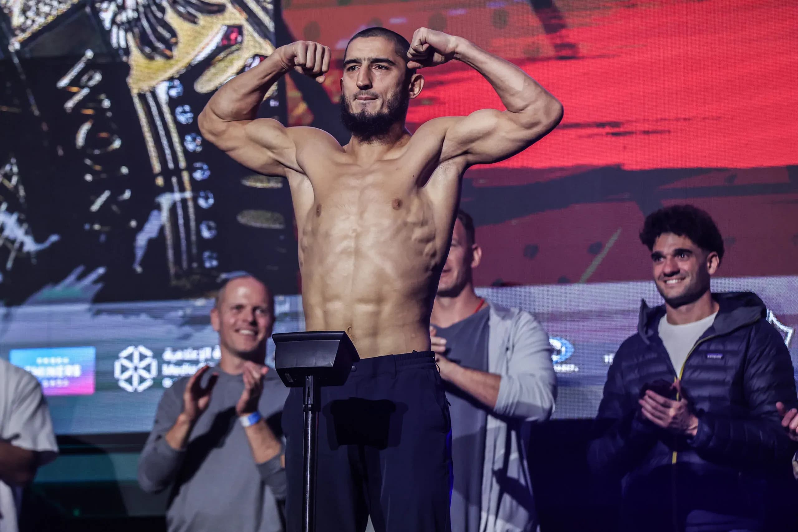 Dagestani MMA fighter Alibeg Rasulov flexes on the scale ahead of ONE 173