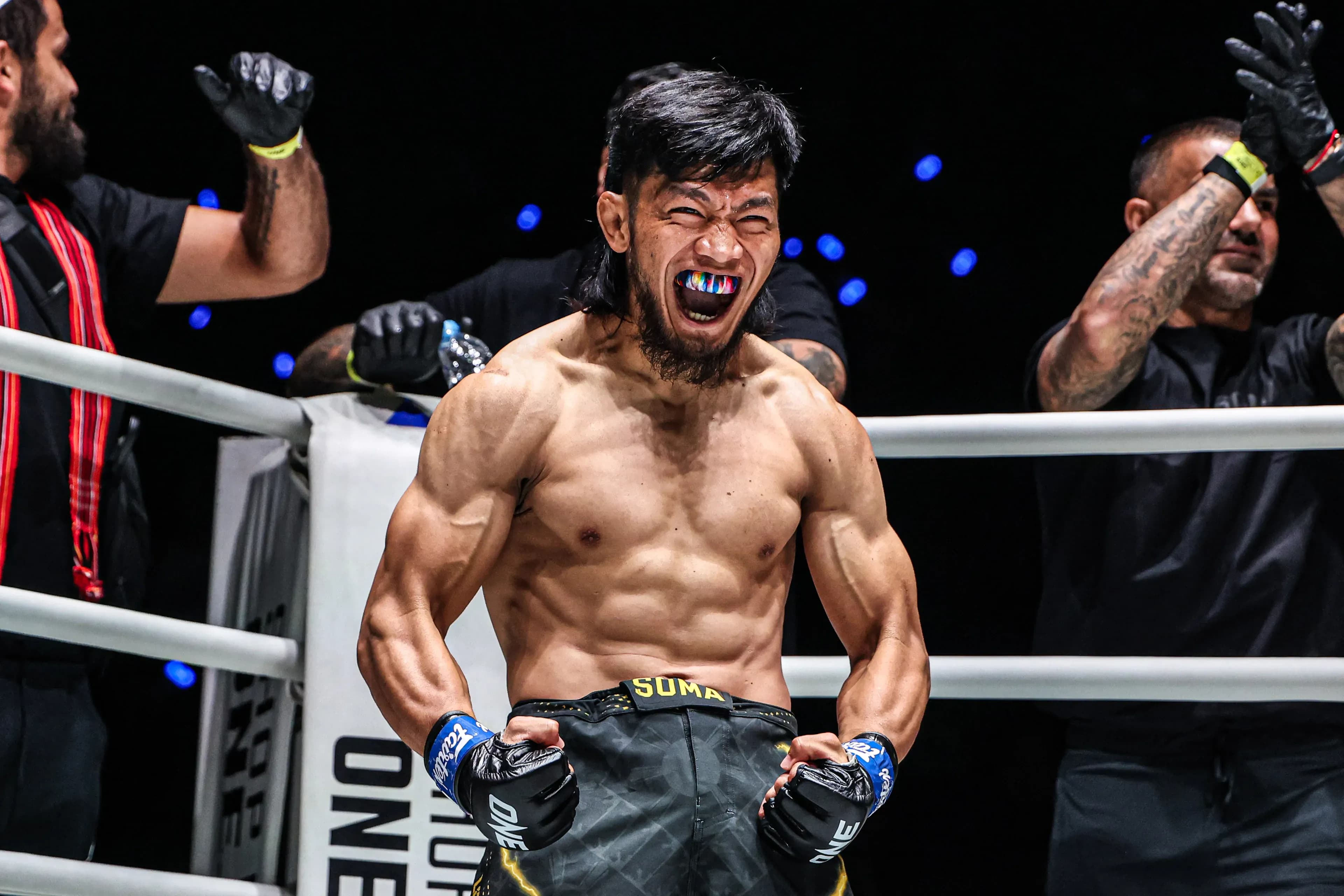 Filipino MMA fighter Lito Adiwang flexes before his fight