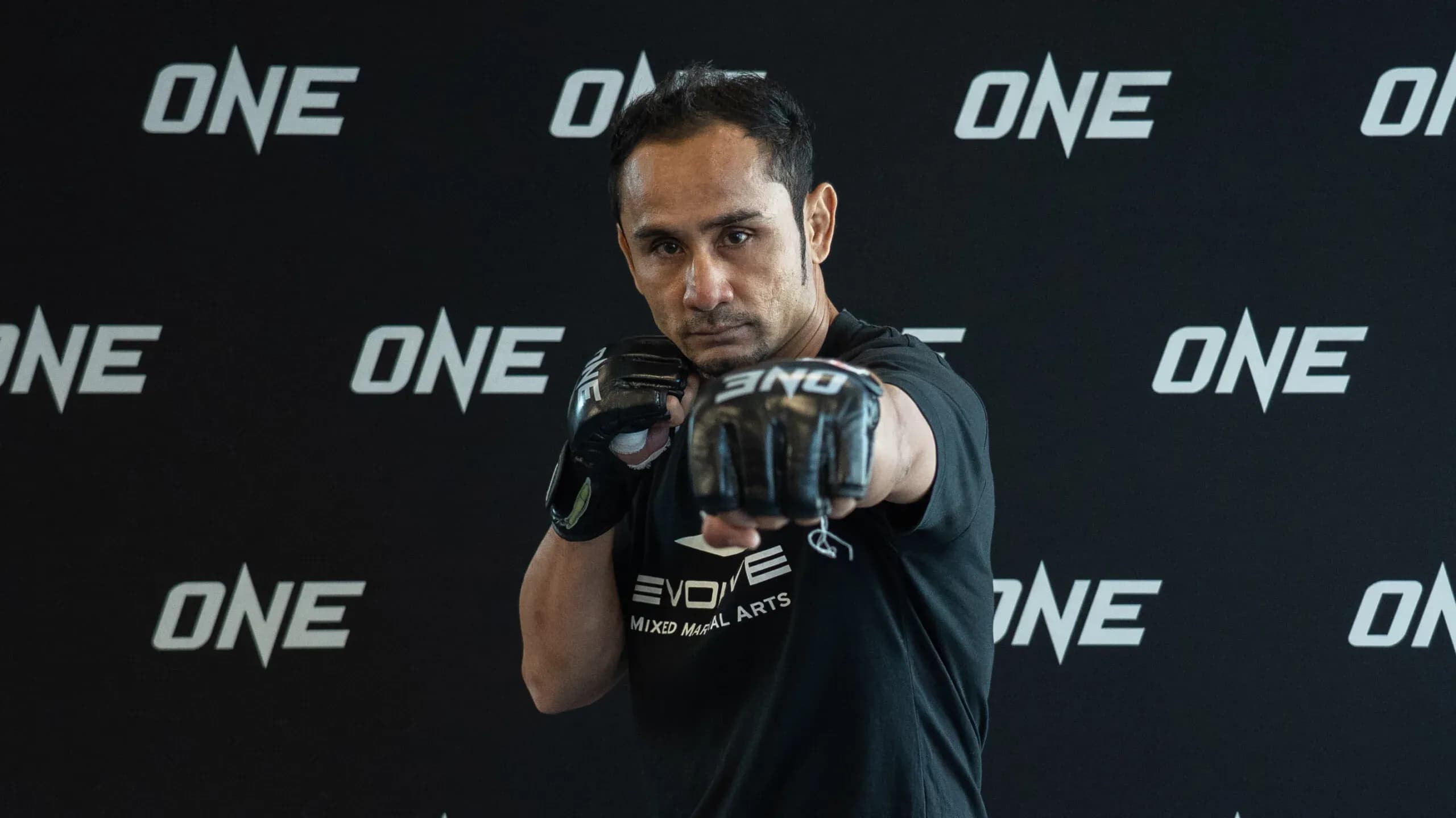 Muay Thai fighter Sam-A Gaiyanghadao pumps out his first at an open workout session