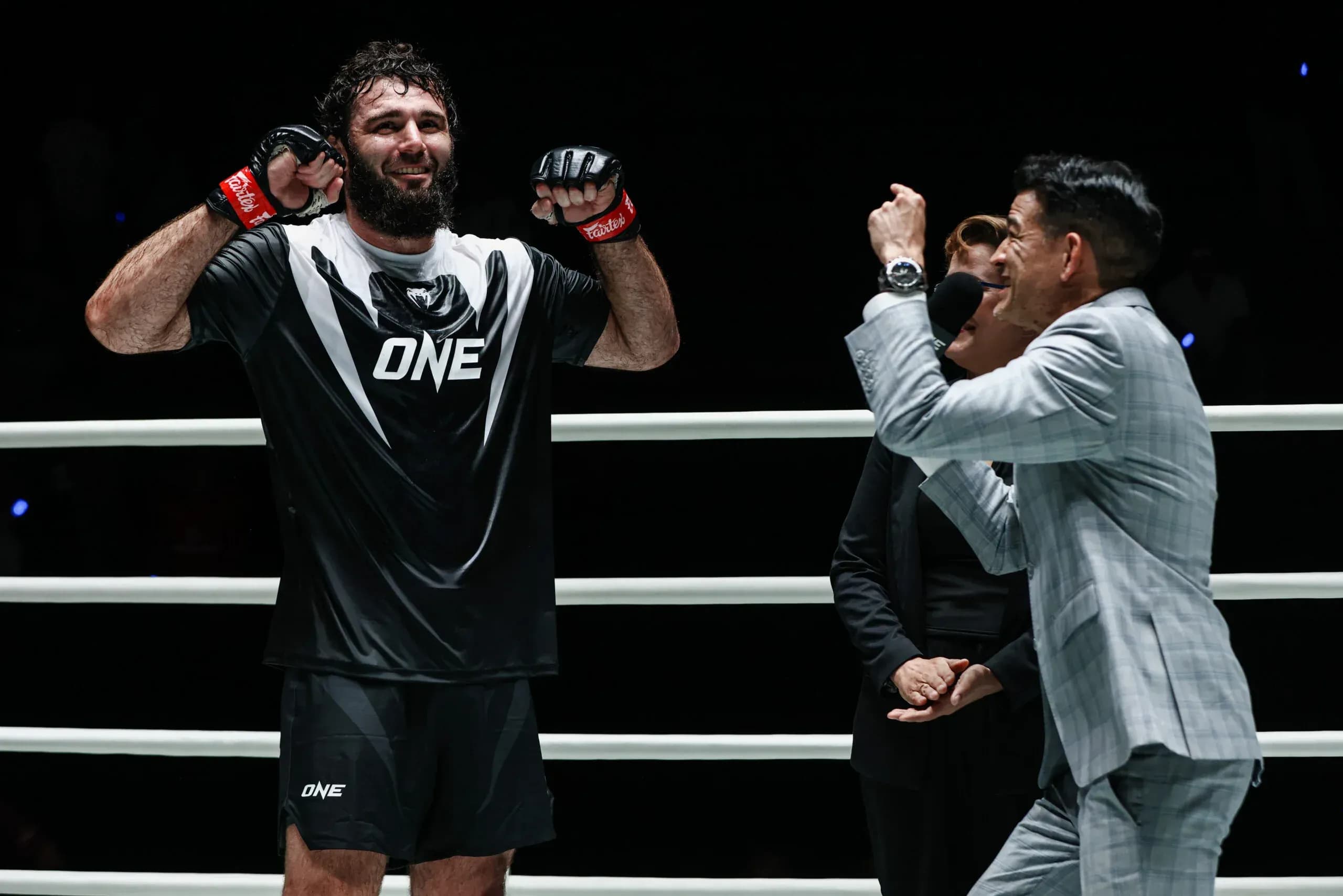 Mitch Chilson tells heavyweight MMA fighter Shamil Erdogan he won a bonus