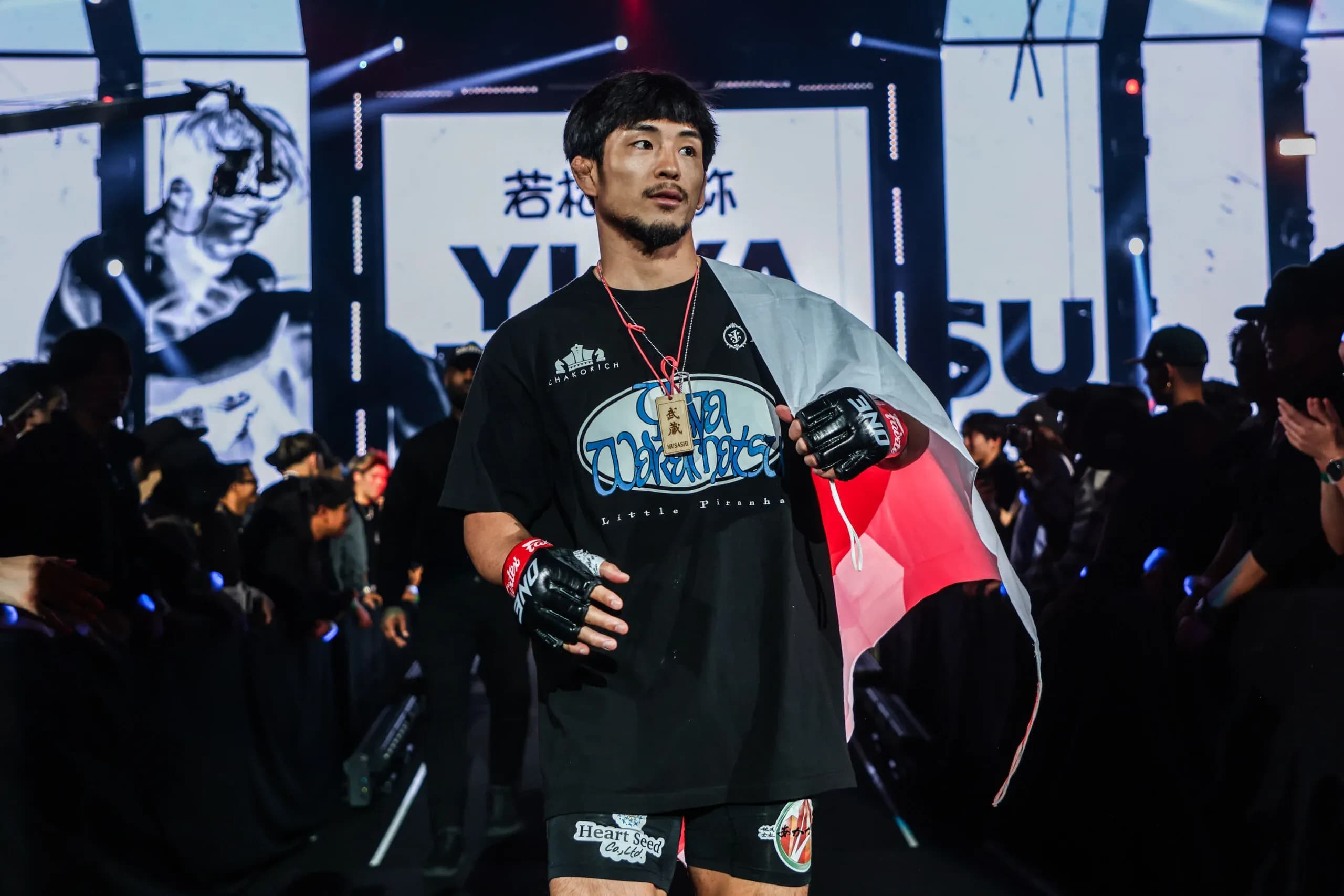 Japanese MMA star Yuya Wakamatsu walks into the arena