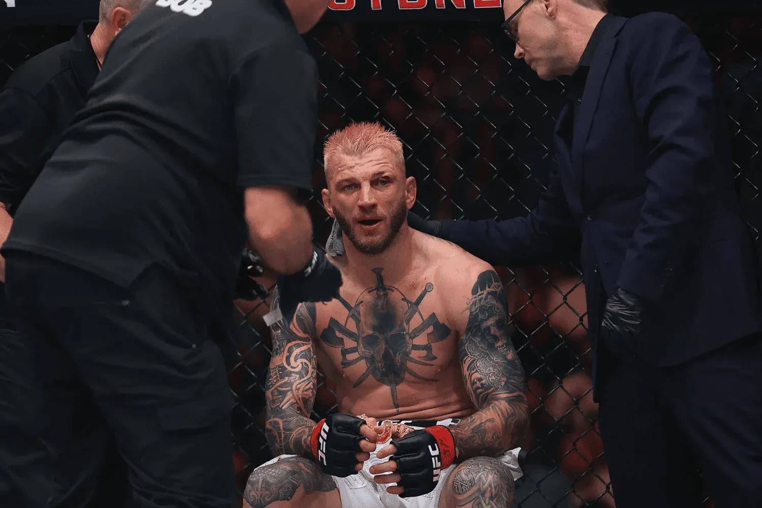 Dan Hooker (middle) of New Zealand seen in a lightweight fight during the UFC 325 event at Qudos Bank Arena