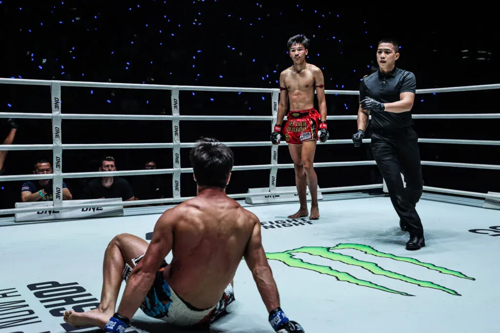 Muay Thai star Aliff Sor Dechapan stares at a grounded Ramadan Ondash
