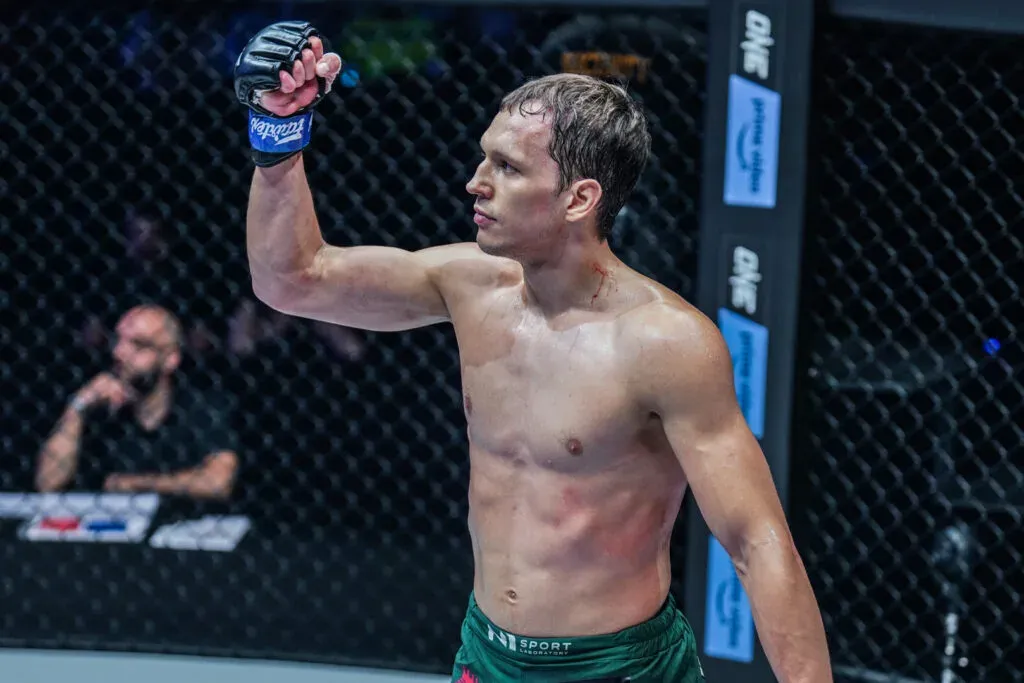 Ilya Freymanov pumps fist in the ONE Championship Circle