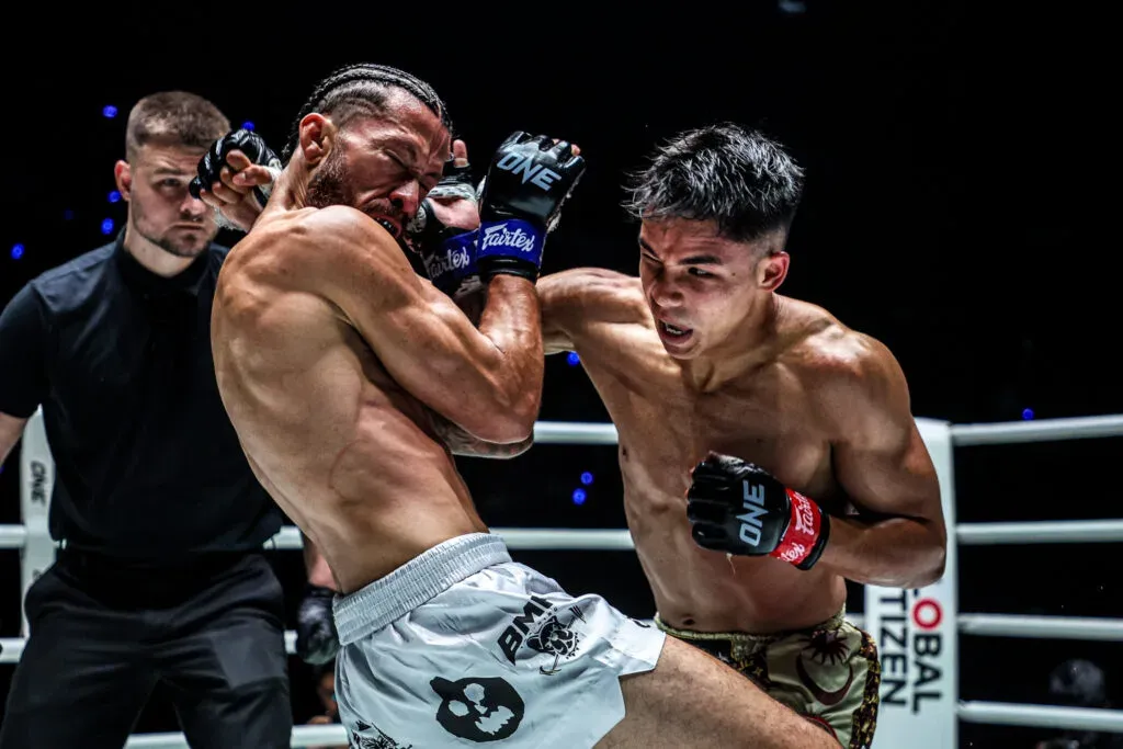 Teenage fighter Johan Ghazali punches Diego Paez