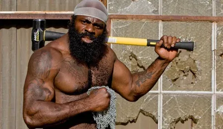 Kimbo Slice, posing with a familiar prop. | Photo: DailyMotion.com