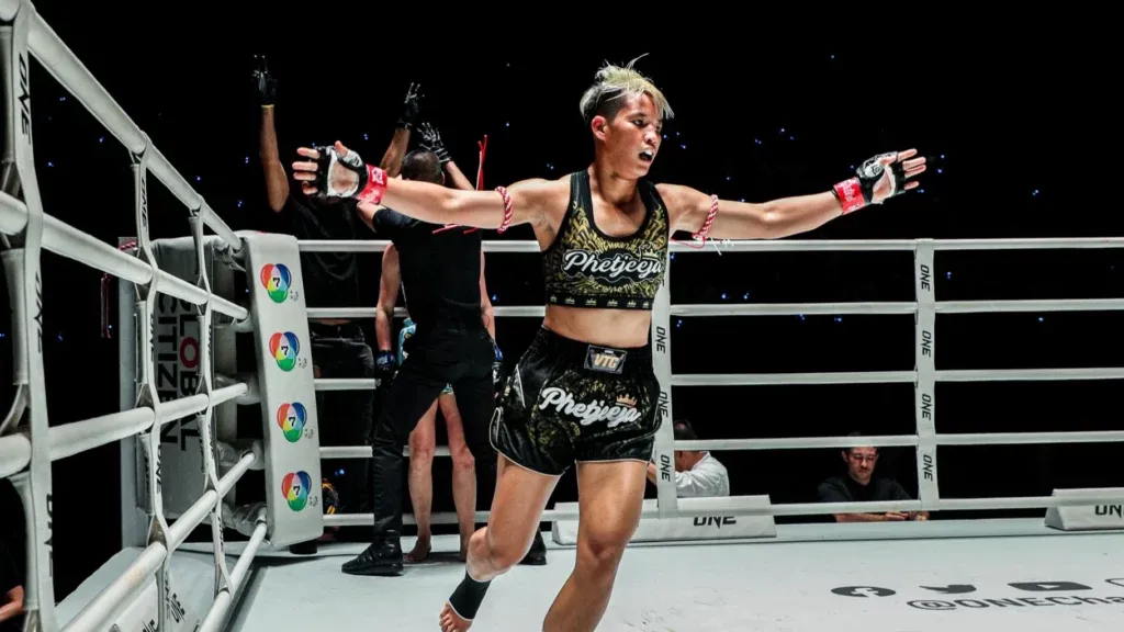 Phetjeeja celebrates a victory in the ring