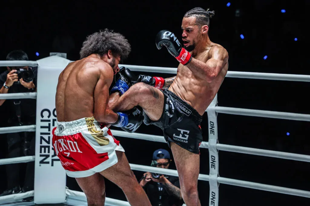 Regian Eersel kicks Alexis Nicolas in the gut during their kickboxing match