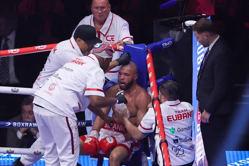 Eubank Jr slumps in his corner after another tough round