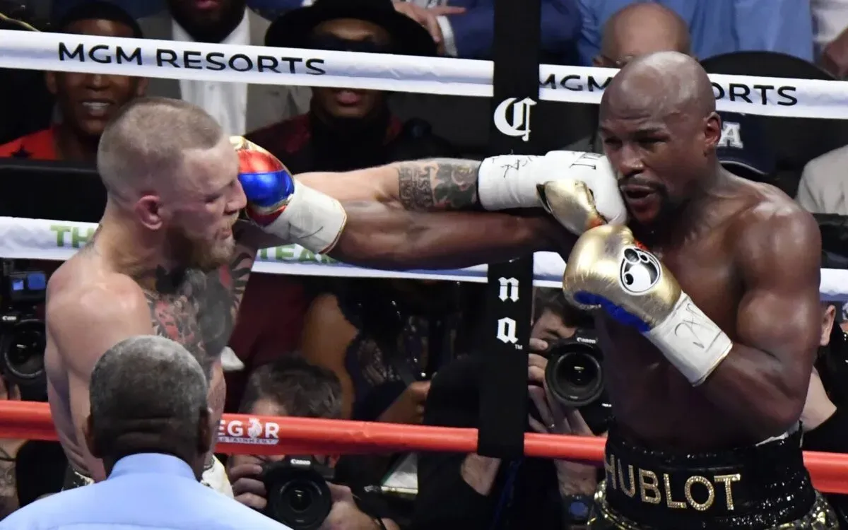 Conor McGregor and Floyd Mayweather land punches