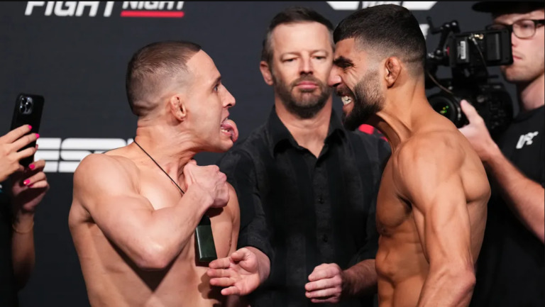 Kai Kara France faces off with Amir Albazi before their fight at a June UFC Fight Night event.