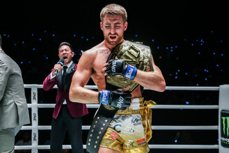 Jonathan Haggerty with the ONE Championship belt