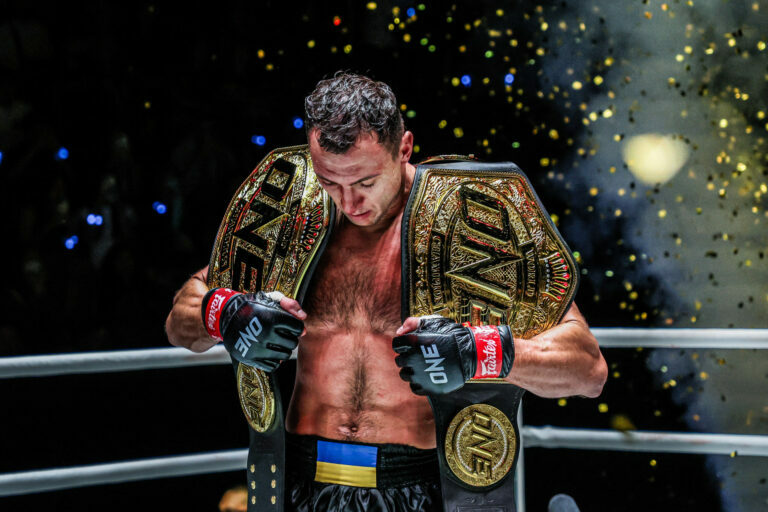 Roman Kryklia donning 2 belts