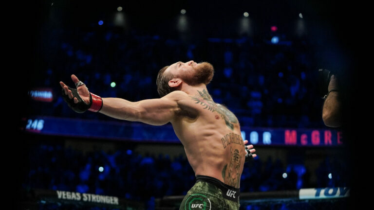 Conor McGregor stretches ahead of a fight with Donald Cerrone