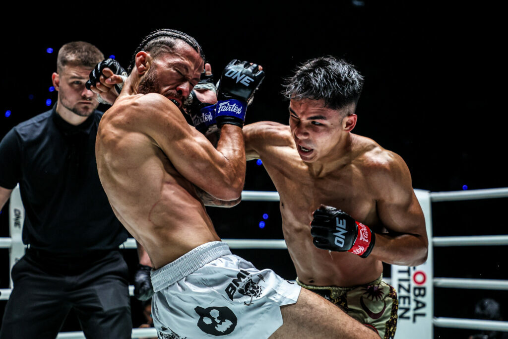 Teenage fighter Johan Ghazali punches Diego Paez