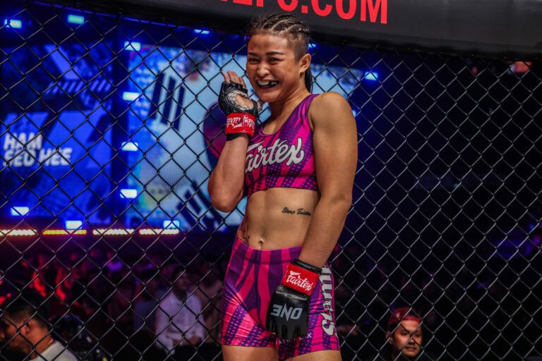 Stamp Fairtex waves before her fight