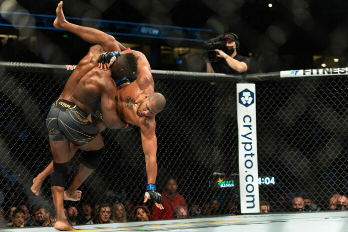 January 22, 2022, Anaheim, California, USA: UFC 270: Ngannou vs Gane: Francis Ngannou taking Ciryl Gane for a ride and Francis Ngannou and Ciryl Gane.