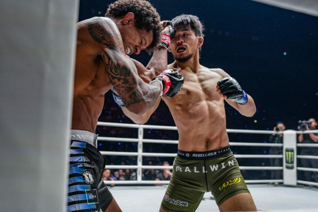 MMA fighter Yuya Wakamatsu punches Adriano Moraes in the corner