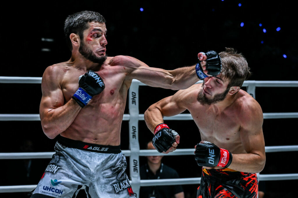 Russian MMA fighter Magomed Akaev cracks Ibragim Dauev with a left hook