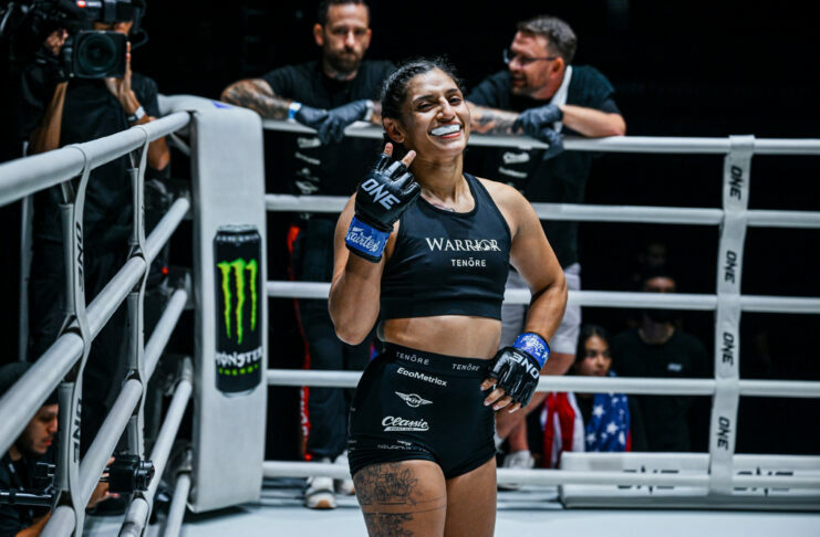 Atomweight MMA fighter Natalie Salcedo poses after her win in the ring