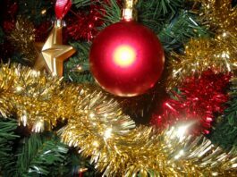 The Christmas tree is all decorated for MMA Under the Tree: 2025 Edition!