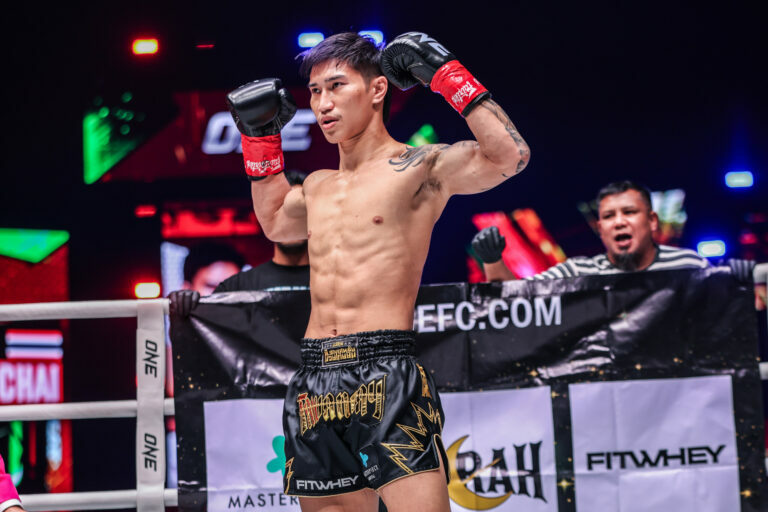 Muay Thai star Tawanchai PK Saenchai flexes in the ring