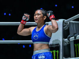 Atomweight MMA fighter Chihiro Sawada poses in the ring corner