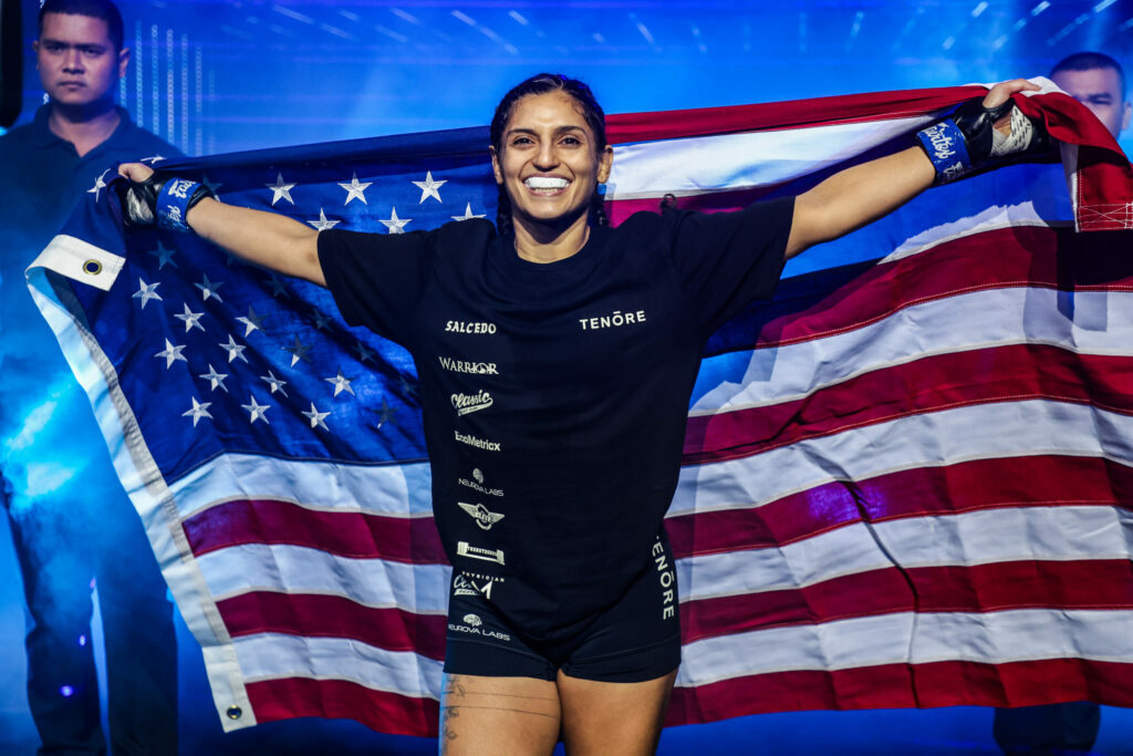 MMA fighter Natalie Salcedo poses with the American flag