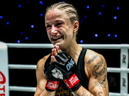 Kickboxing and Muay Thai star Stella Hemetsberger celebrates with her hands together